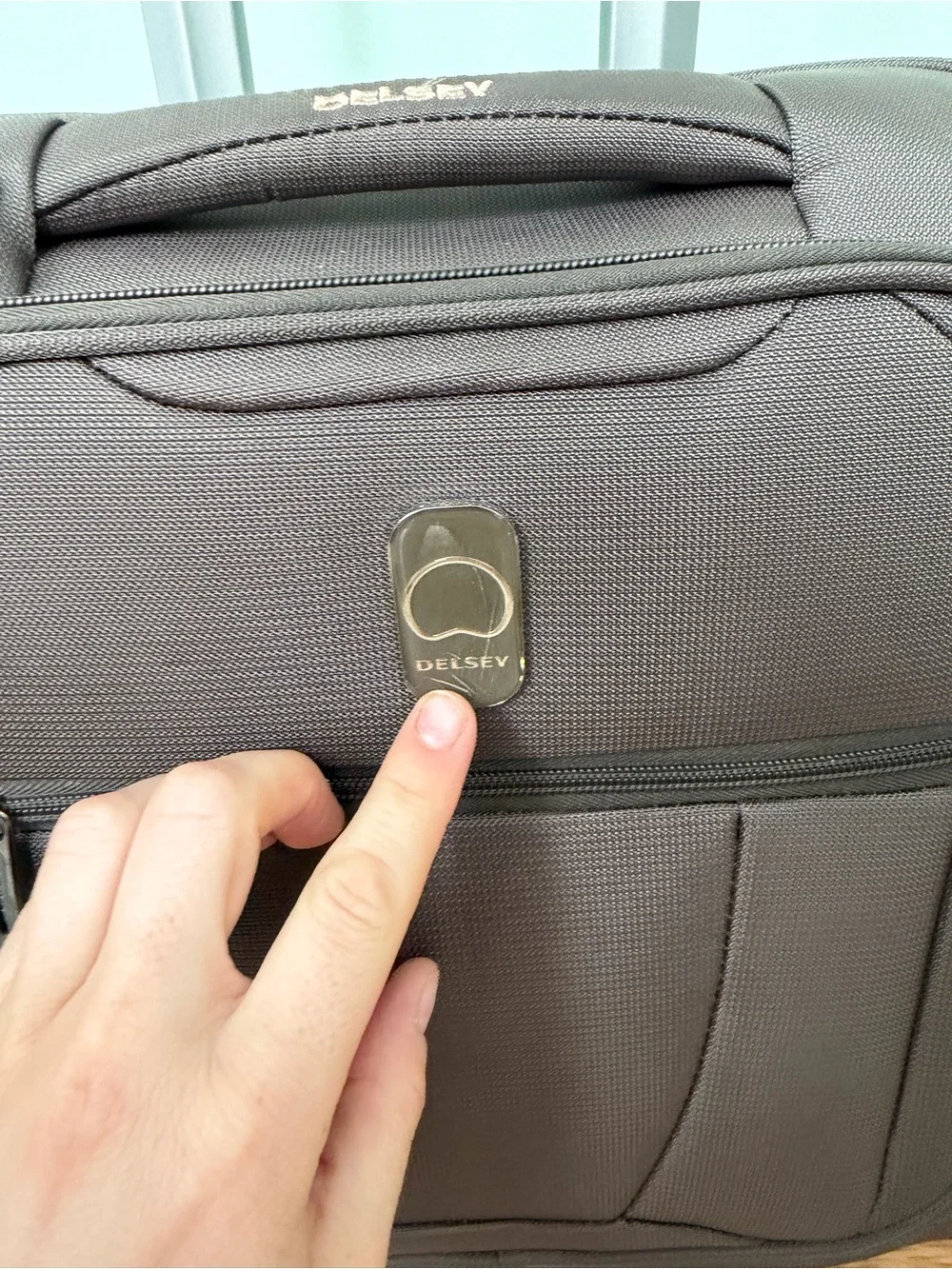 Brown Rolling Carry-On under seat luggage